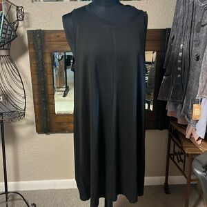 Women’s black midi dress by Muskie
